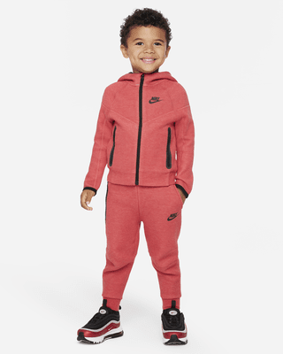 Baby pink nike tracksuit hotsell